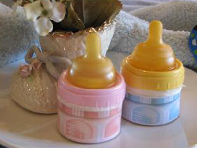 Roundabout Pink Baby Bottle Cupcake Wrappers 12 ct.